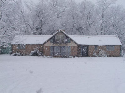 British White Home in snow.